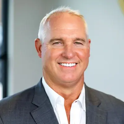 Dr. Timothy Vanitvelt, dentist at Flint dental practice, smiling in professional portrait.